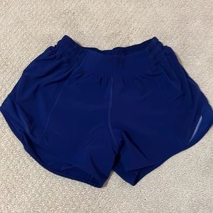 royal blue lululemon hotty hot shirts size four with four inch inseam